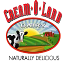 A dairy logo with a cow and sun in the background.