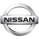 A silver nissan logo on top of a white background.